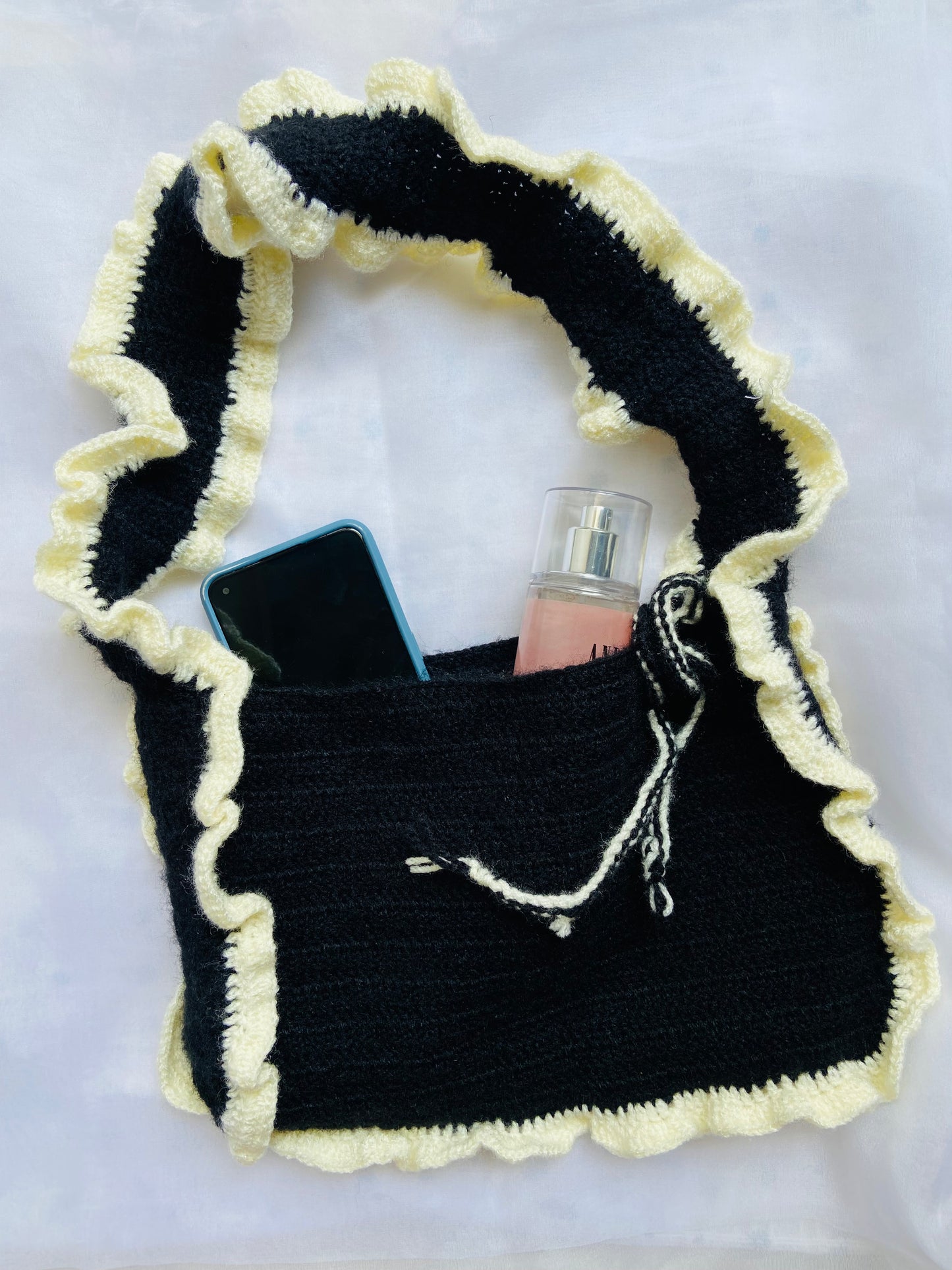 Handcrafted Black Crochet Shoulder Bag with Ruffle Trim